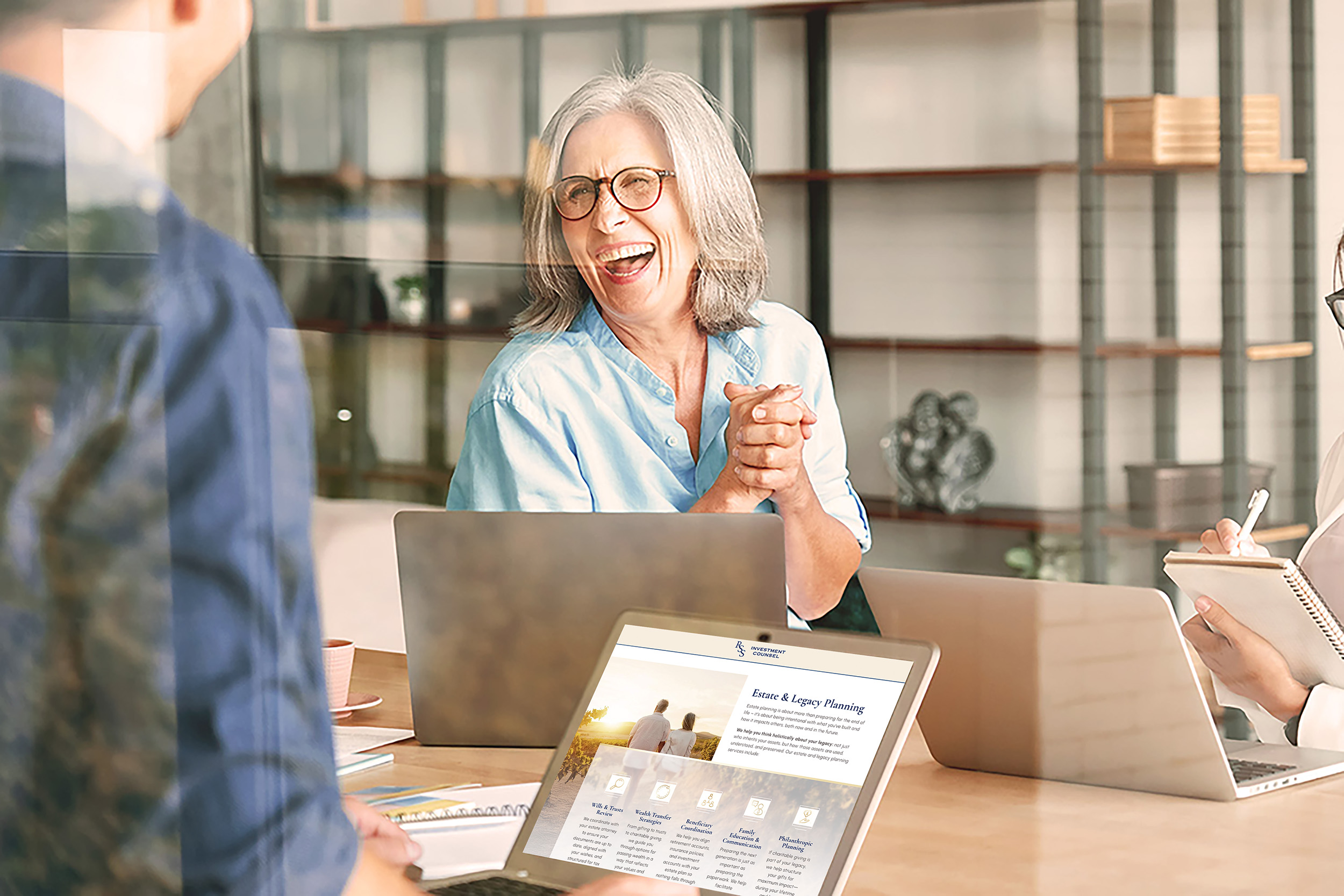 Professional woman chatting with colleague
